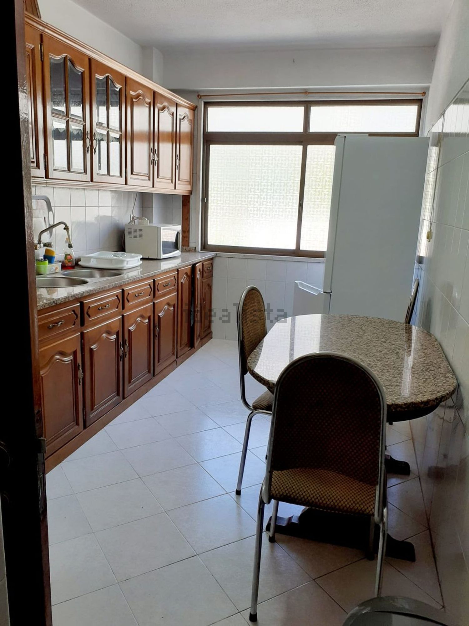 出租房间在Rua Bento de Jesus Caraça, 15 - 厨房