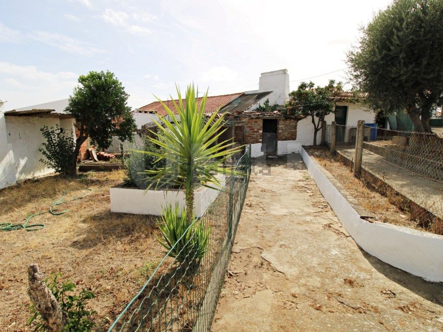 小楼房或独栋别墅出售在Travessa da R. de Évora, 8 - 花园