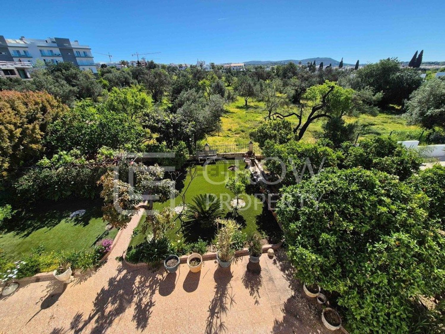 小楼房或独栋别墅出售在Centro Oeste da Cidade de Loulé - 花园