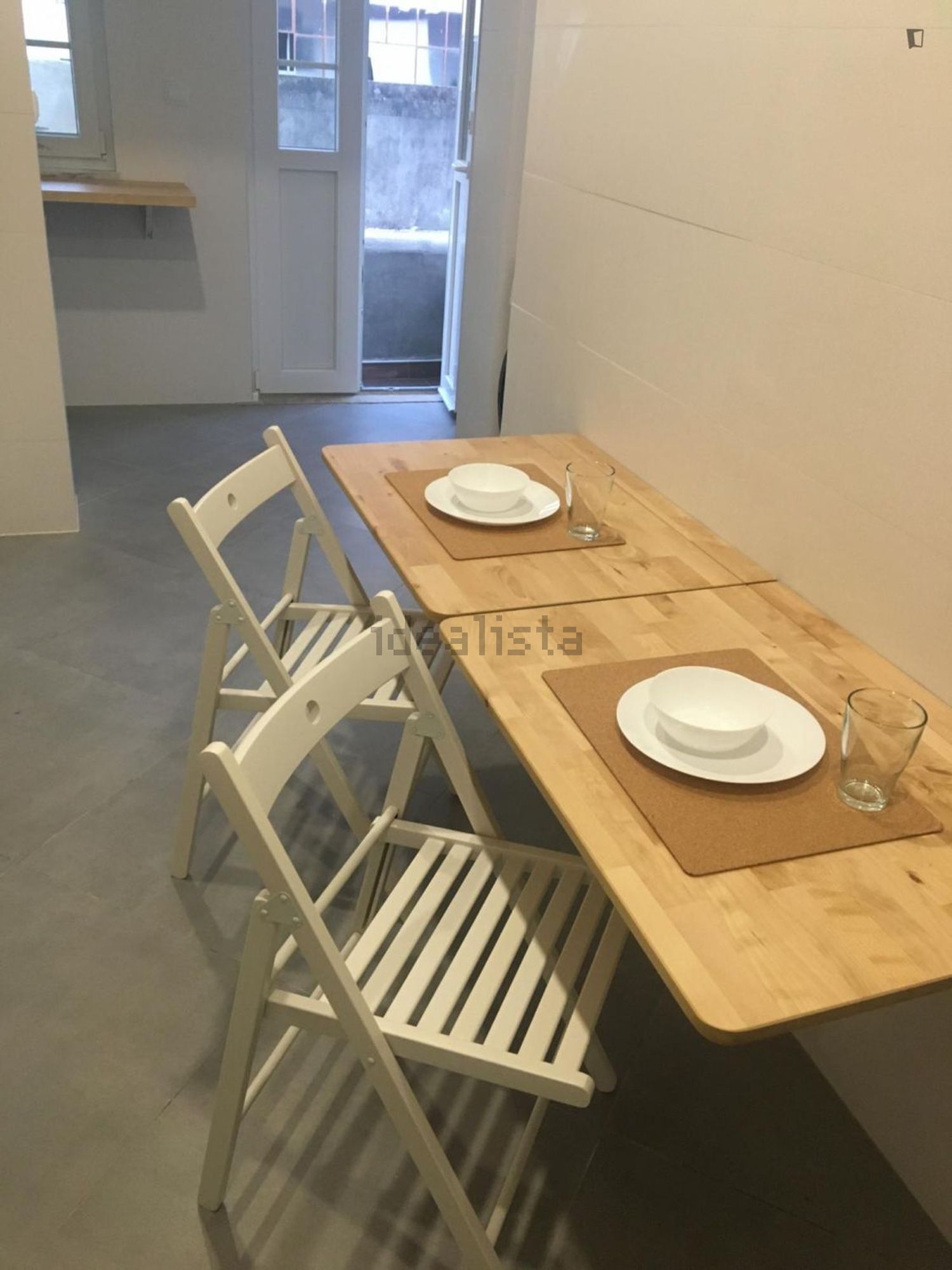 出租房间在Rua Angra do Heroísmo - 客厅