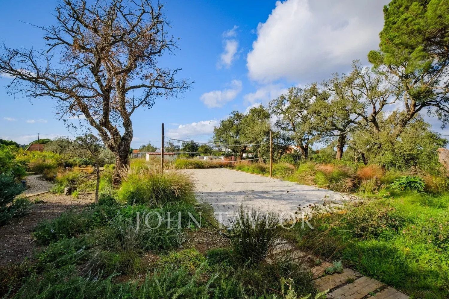 小楼房或独栋别墅出售在Rua de Melides - 花园