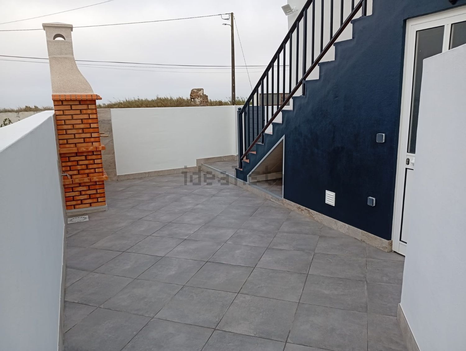 出租小楼房在Rua da Palmeira, 1 - 院子