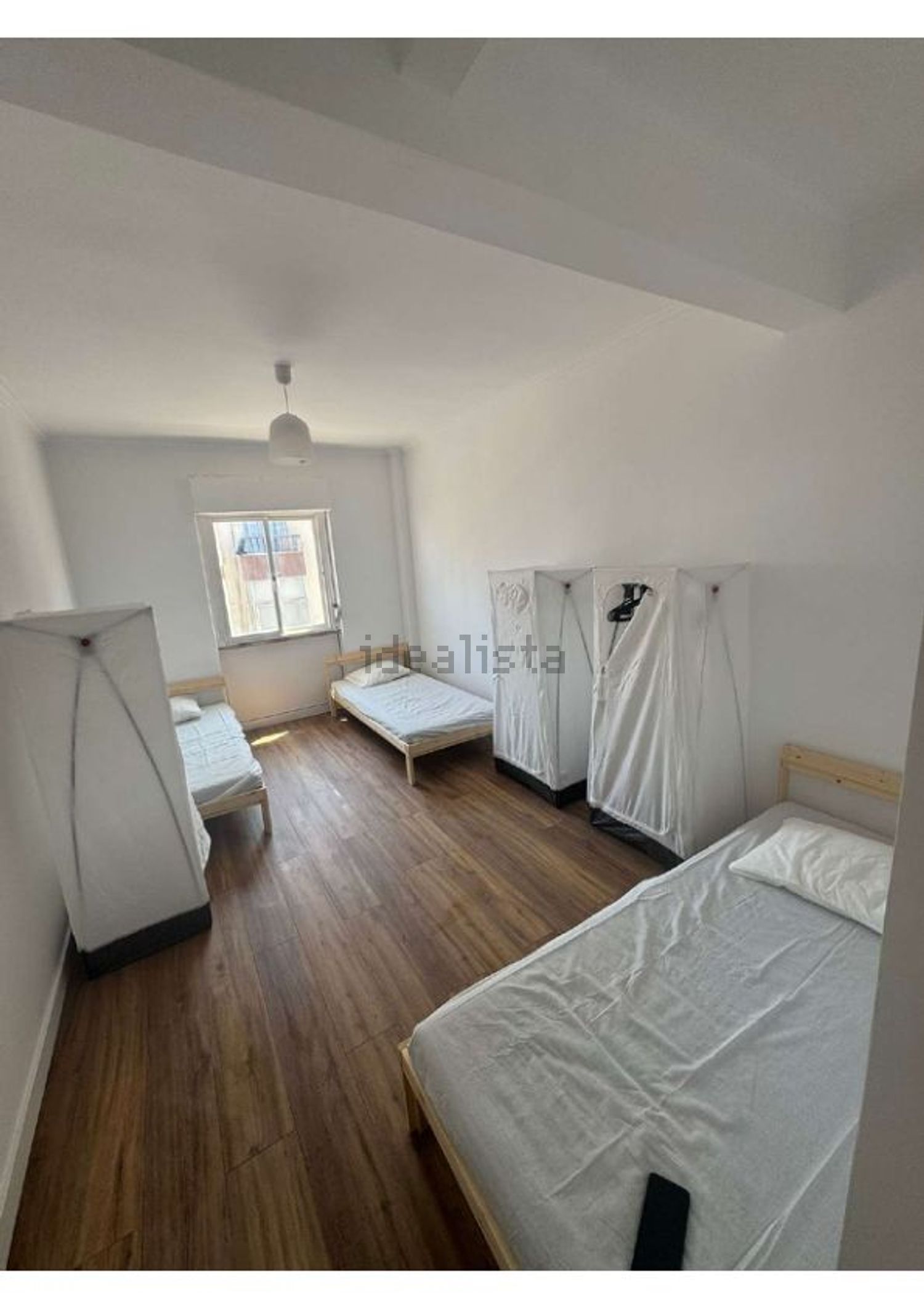 出租房间在Rua Fernão Mendes Pinto, 440 a - 卧室