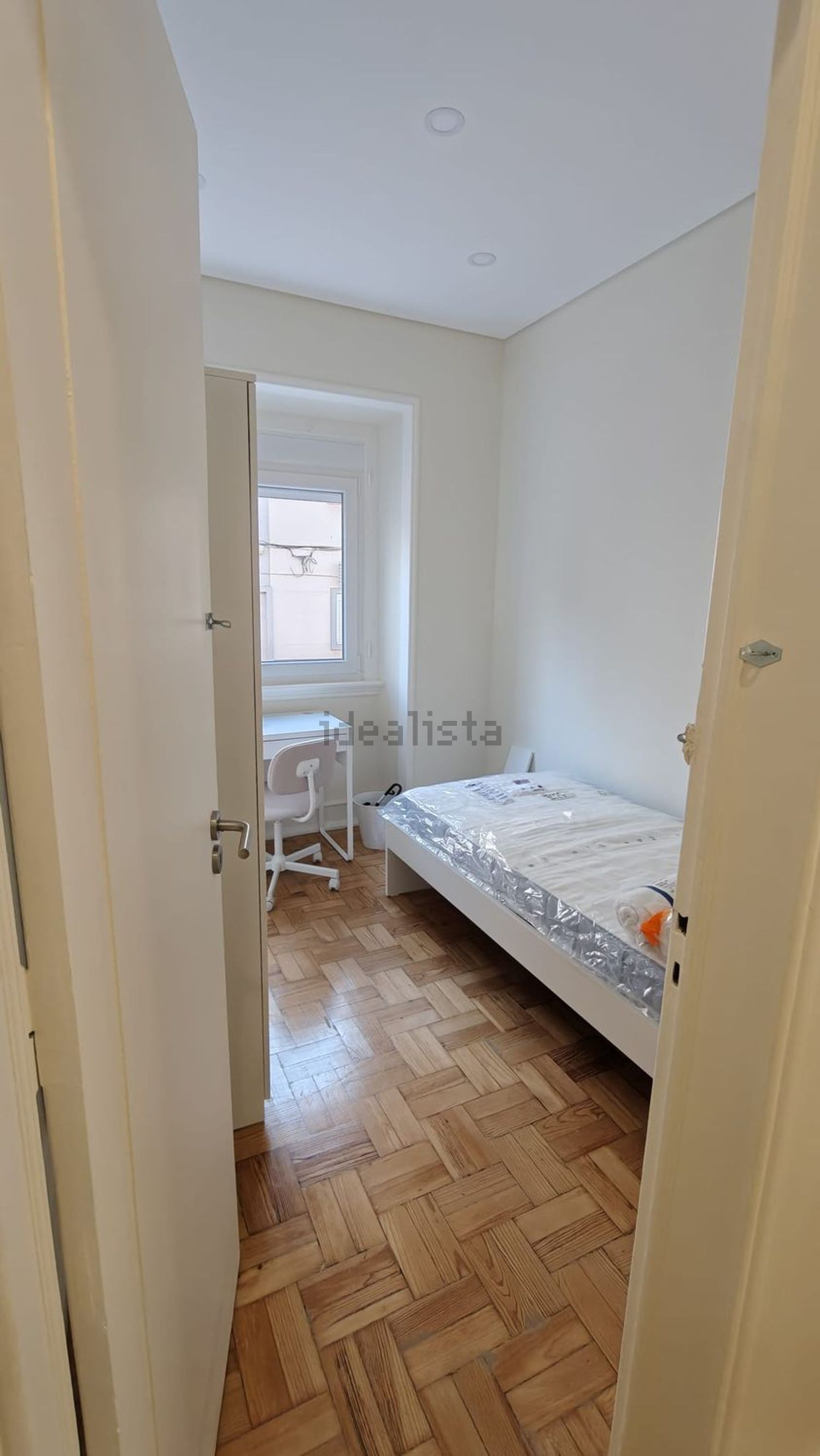 出租房间在Rua Mouzinho de Albuquerque, 32 - 卧室