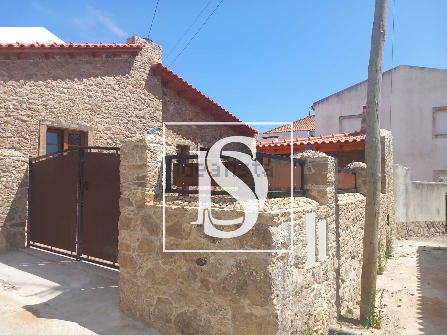 联排别墅出售在São Bartolomeu dos Galegos e Moledo - 外立面