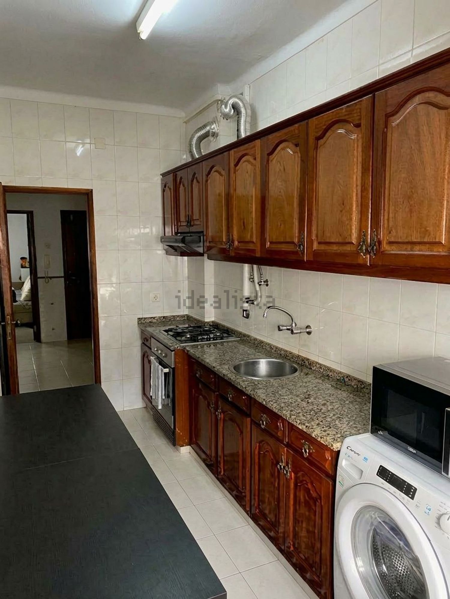 出租公寓 t1在Rua Fernão de Magalhães, 14 - 厨房