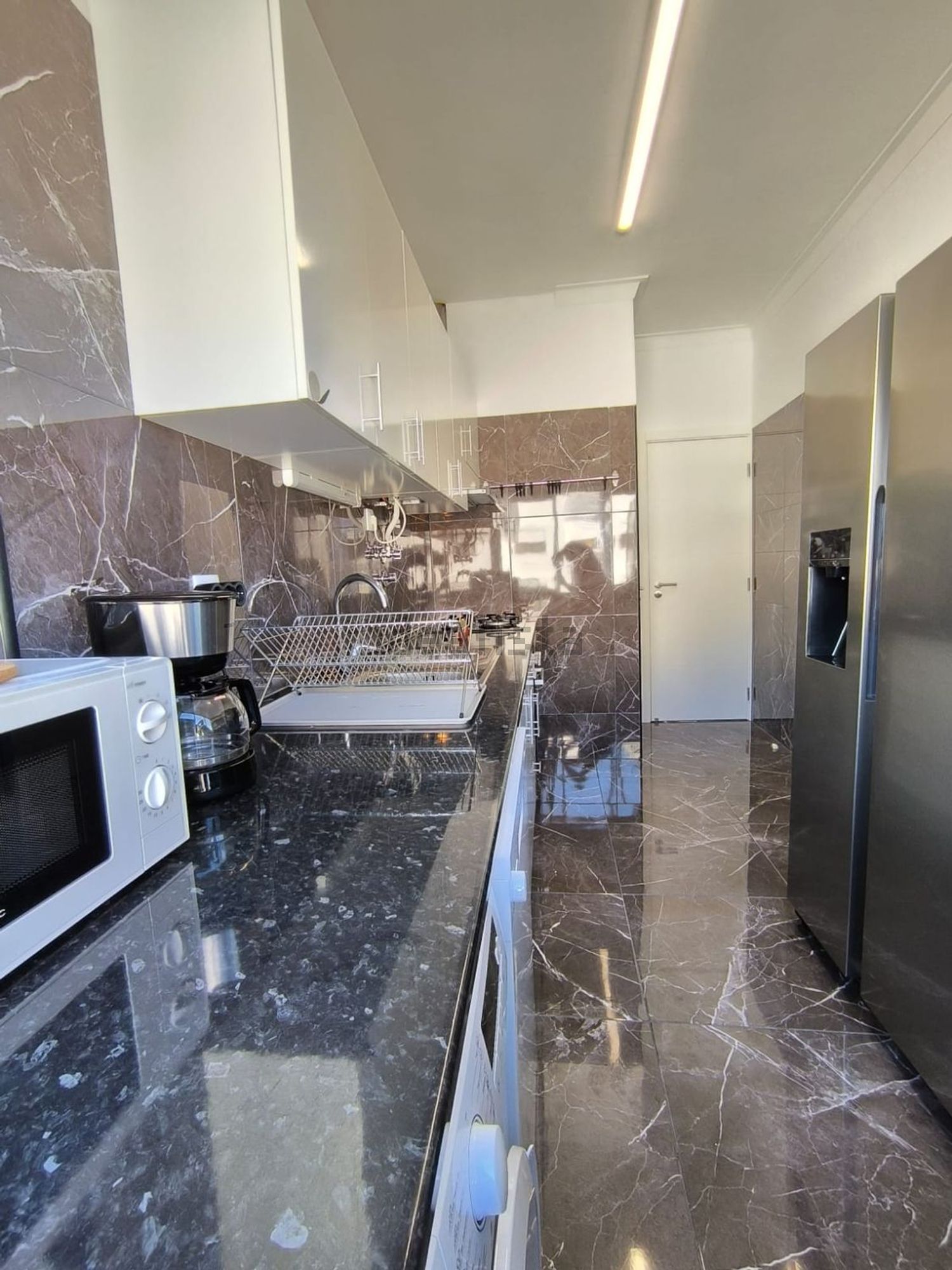 出租房间在Rua Aquilino Ribeiro - 厨房