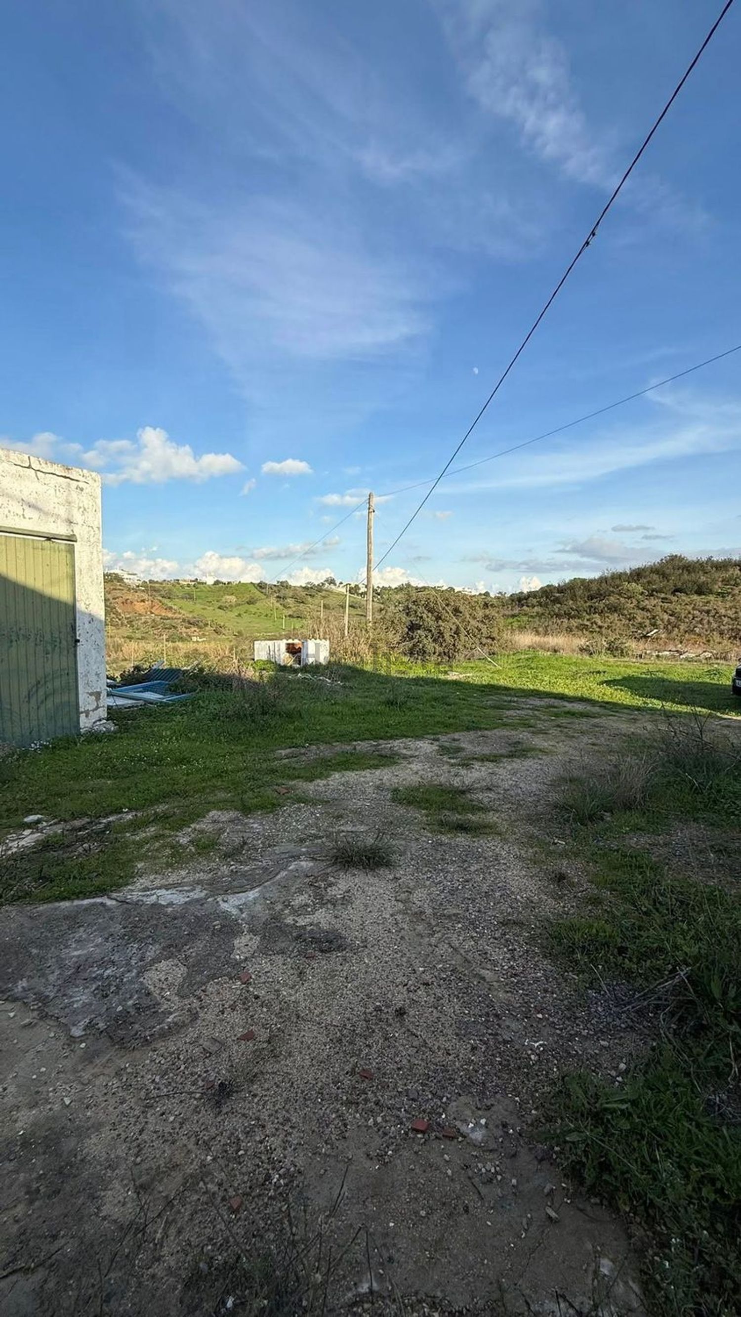 小楼房或独栋别墅出售在 Junqueira - Beliche - 环境