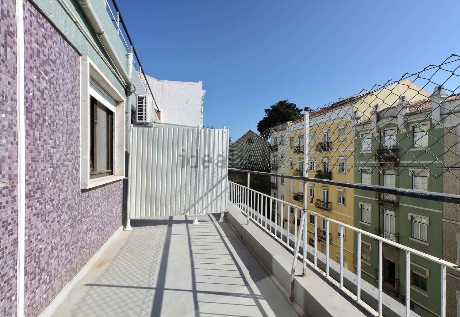 出租房间在Rua Ferreira Lapa, 4 - 阳台